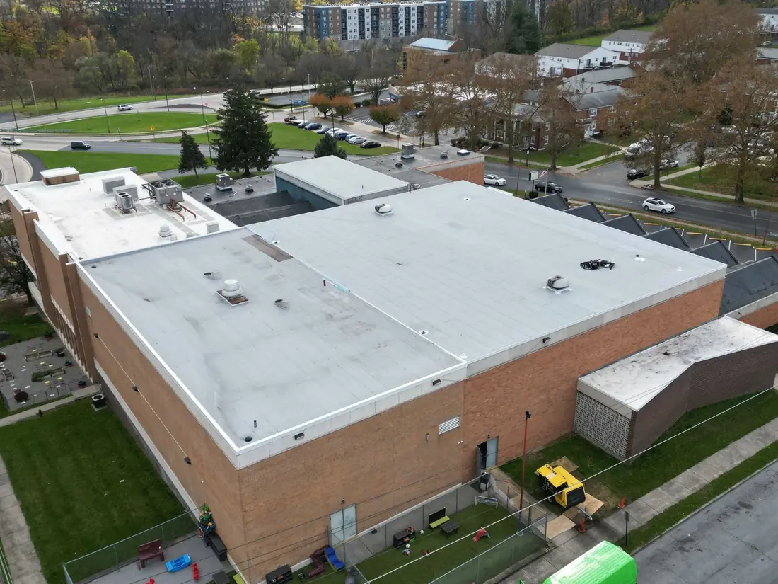 Large white membrane roof on the Allentown YMCA after completion
